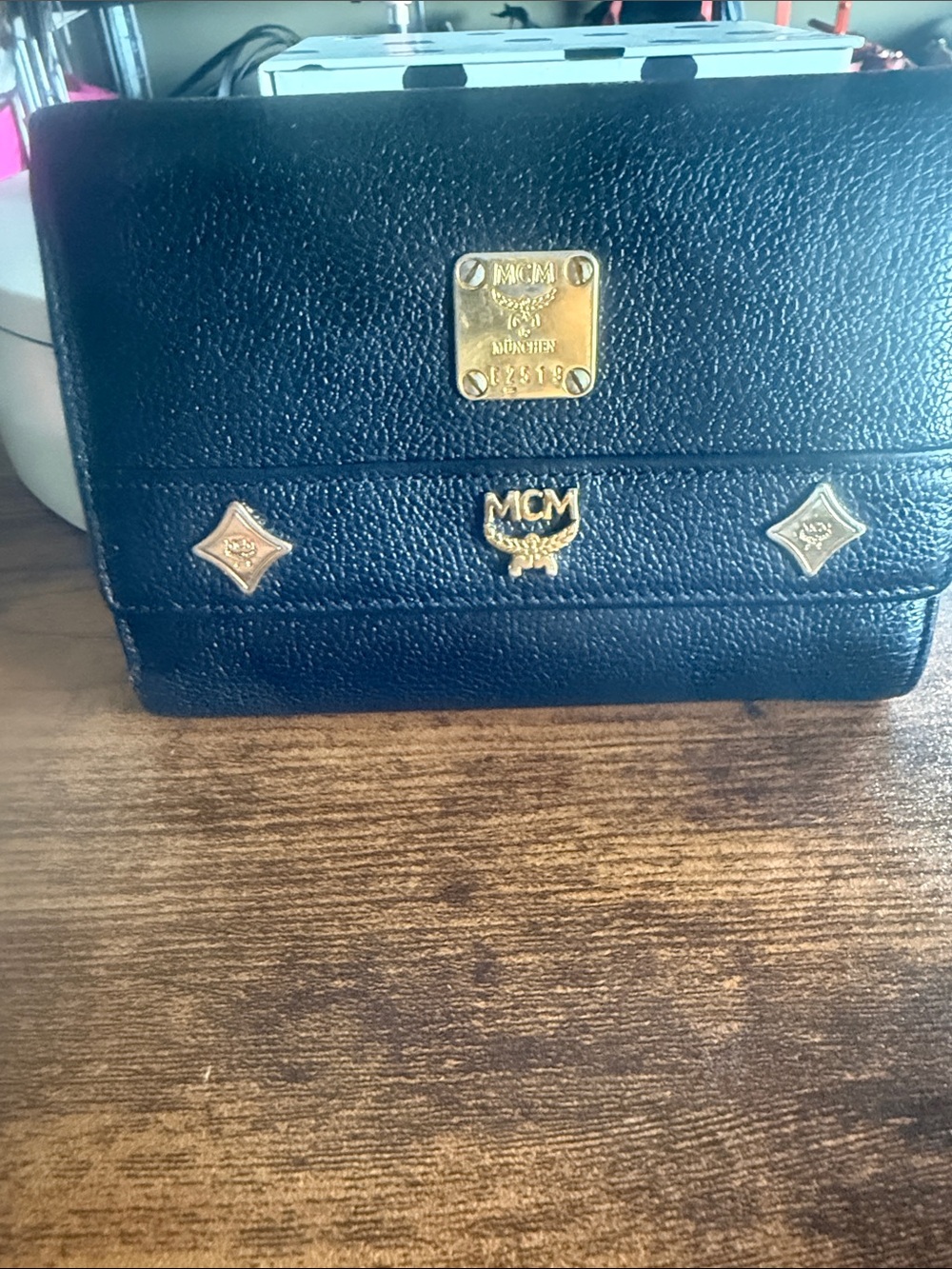 MCM Black Leather Men's Wallet with Gold Emblem Hardware